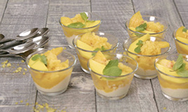 Mini dessert cups with mango topping