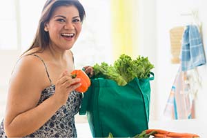 increase-fiber-intake-300x200 Person carrying fresh grocery produce